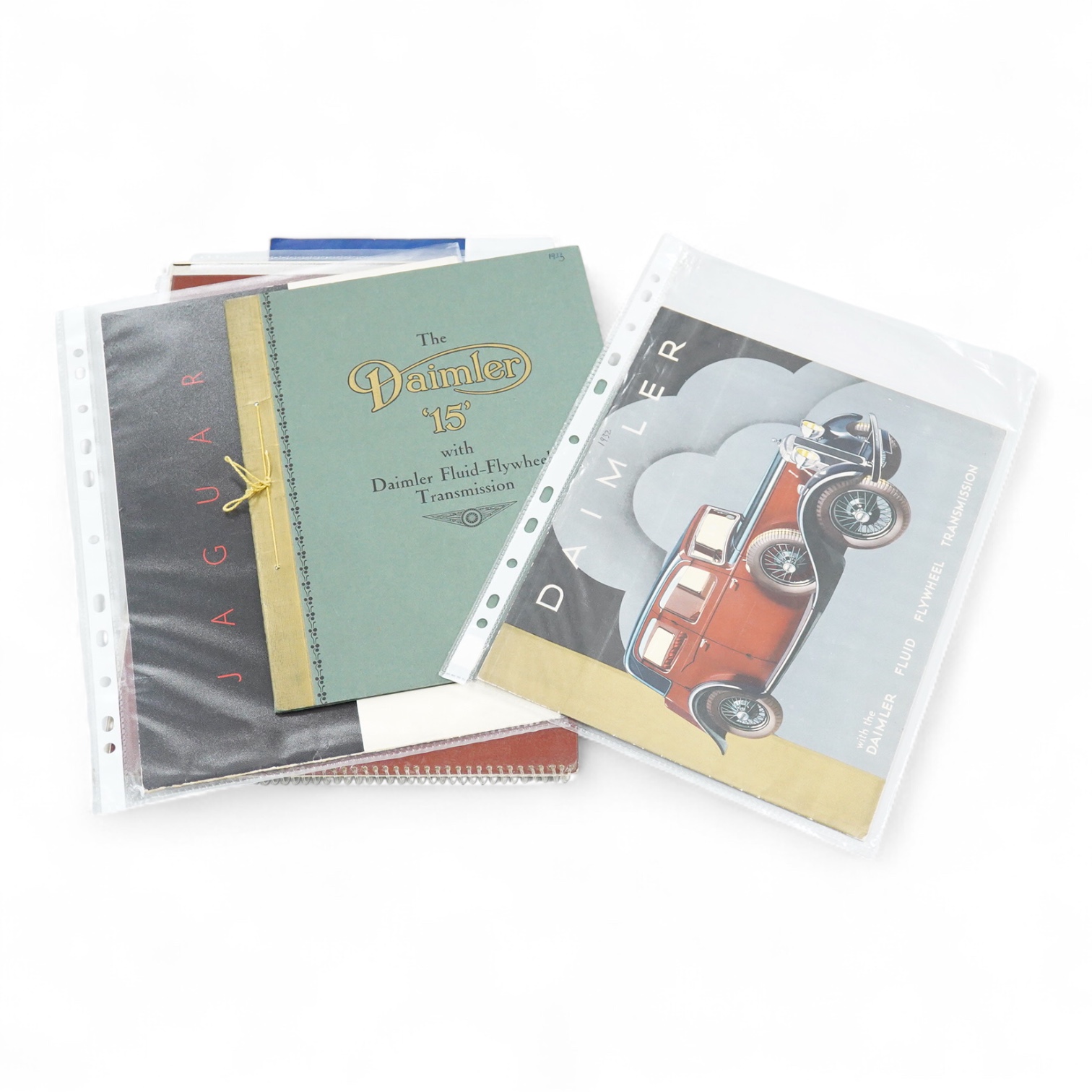 Six 1930s to 1960s Jaguar and Daimler motor car manufacturer’s brochures; the Daimler 15 (produced 1932-37), a folding poster of the 1930s Daimler range, the Jaguar XK140 (produced 1954-57), the Jaguar Mk.II (produced 19